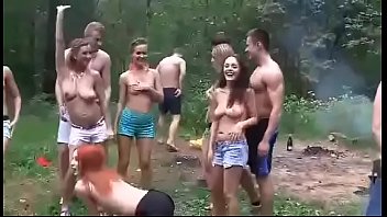 Outdoors in the woods, guys and chicks have the wildest and most depraved gangbang